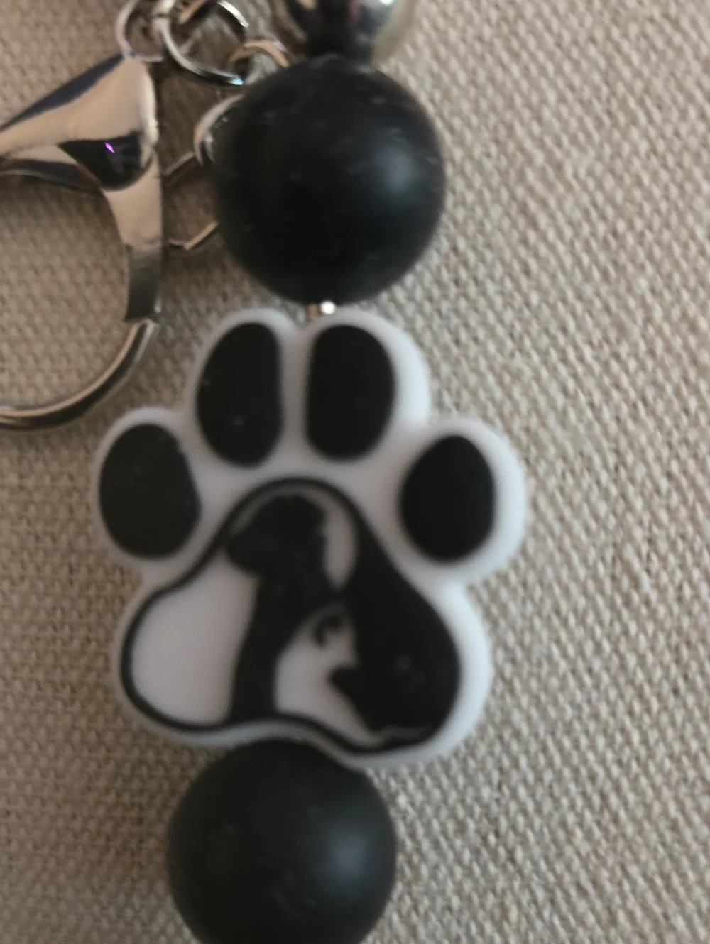 Source Unknown Black and White Paw Charm Keychain